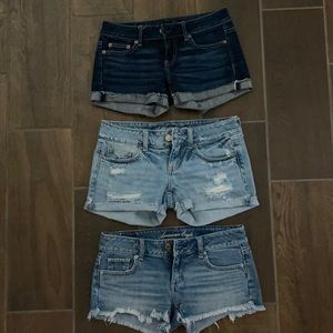 3 pairs of Size 0 American Eagle jean shorts.